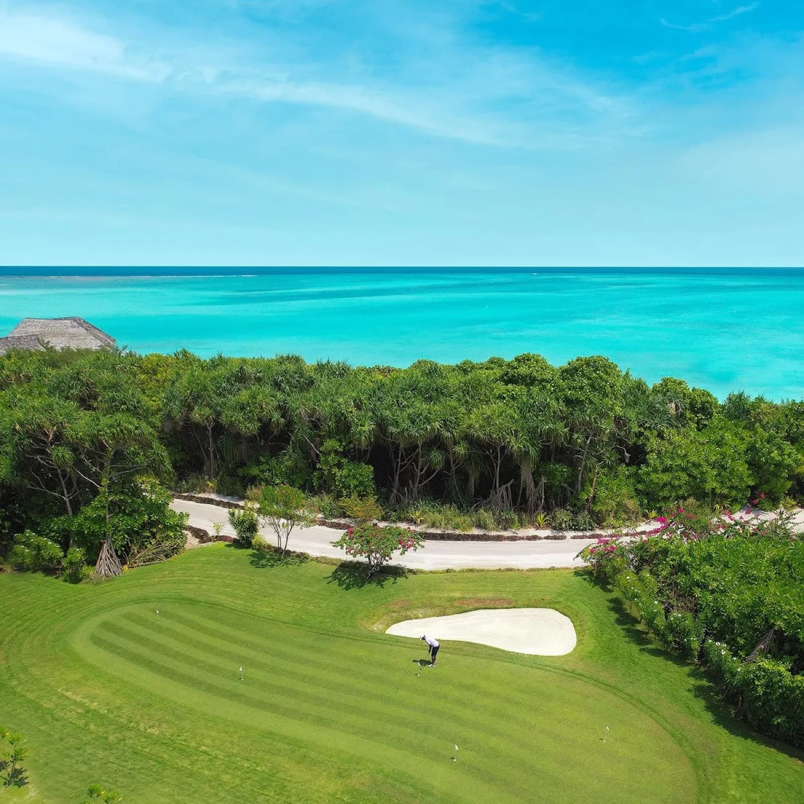 Golf green by the ocean at Hideaway Maldives